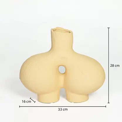 Beige ceramic abstract vase 28 cm height 33 cm width ideal for console table and living room decor.