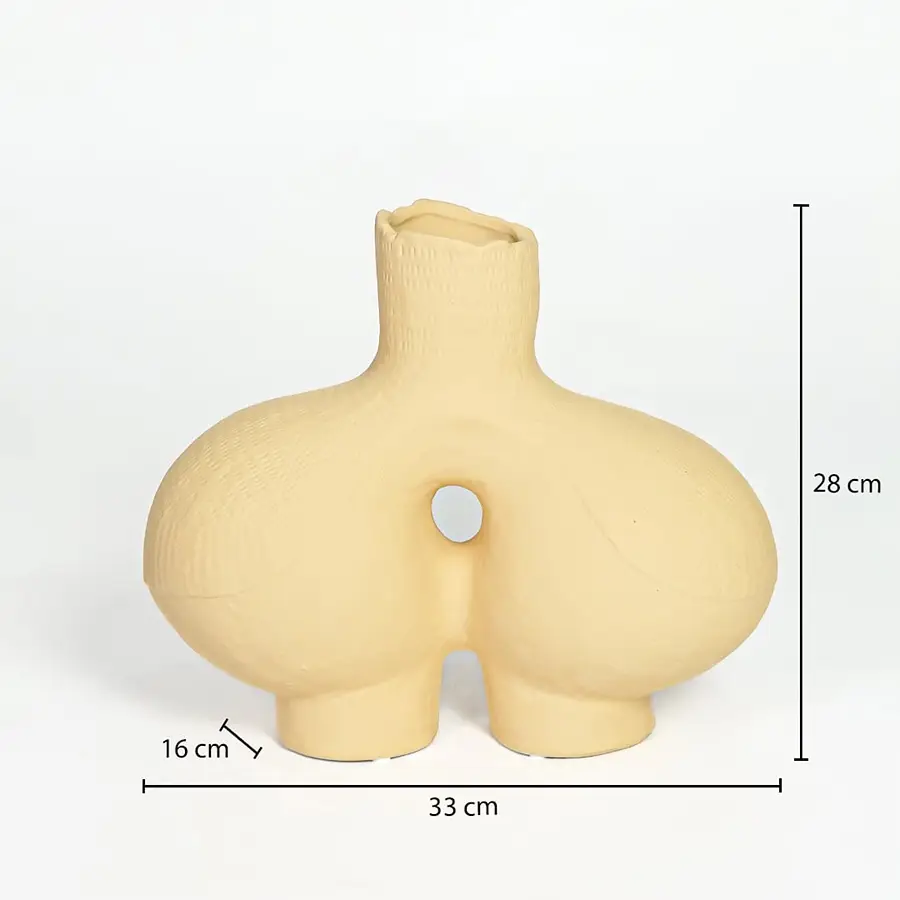 Beige ceramic abstract vase 28 cm height 33 cm width ideal for console table and living room decor.
