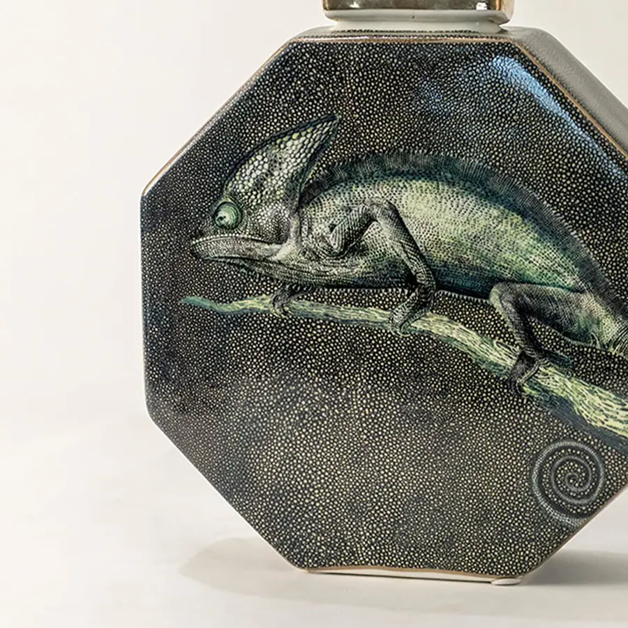 Dark green ceramic jar with engraved horse artwork in a front view perfect for rustic décor themes and stylish tabletop placement.