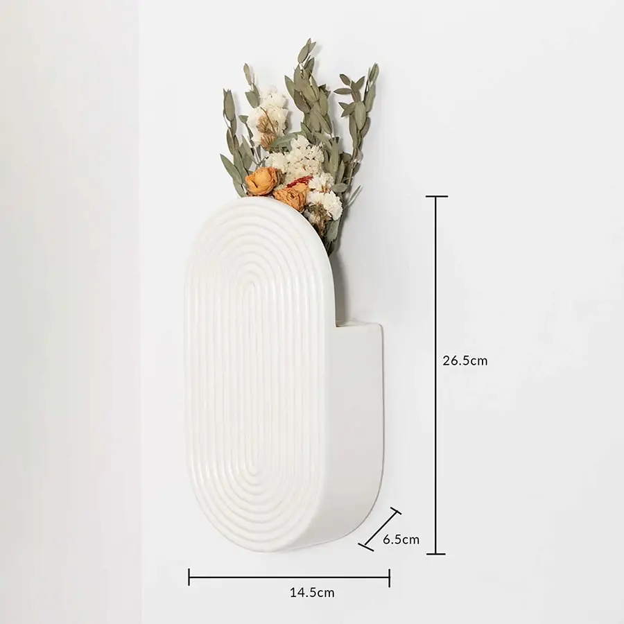 White ceramic wall vase shown with 26.5 cm height 14.5 cm length and 6.5 cm width for accurate decor placement.