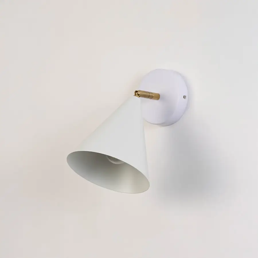 White conical wall sconce shown switched off on a clean white background highlighting its smooth modern metal design ideal for elegant interior decor.