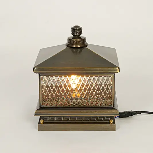 Vintage style outdoor pillar light with textured glass panels and metal top on neutral background perfect for classic exterior decor lighting.