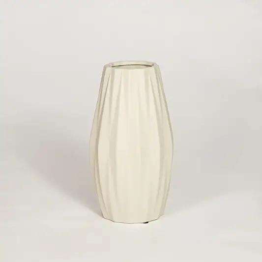 Modern beige ceramic fluted decorative vase ideal for dried flower arrangement on console table shelf and stylish home decor.