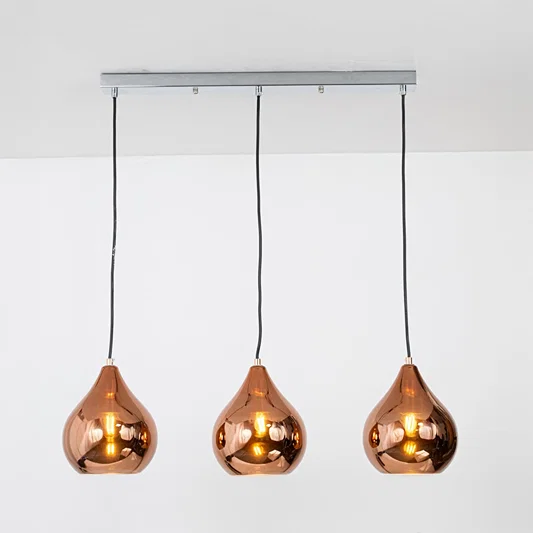 Amber glass pendant lights with metallic finish designed for elegant contemporary home decor spaces.