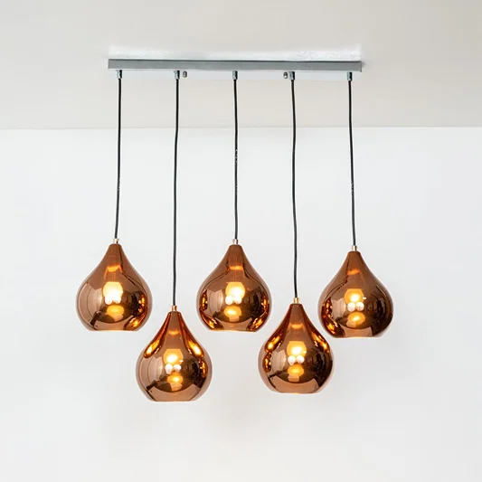 Amber metallic glass pendant lights designed for sophisticated contemporary home decor spaces.