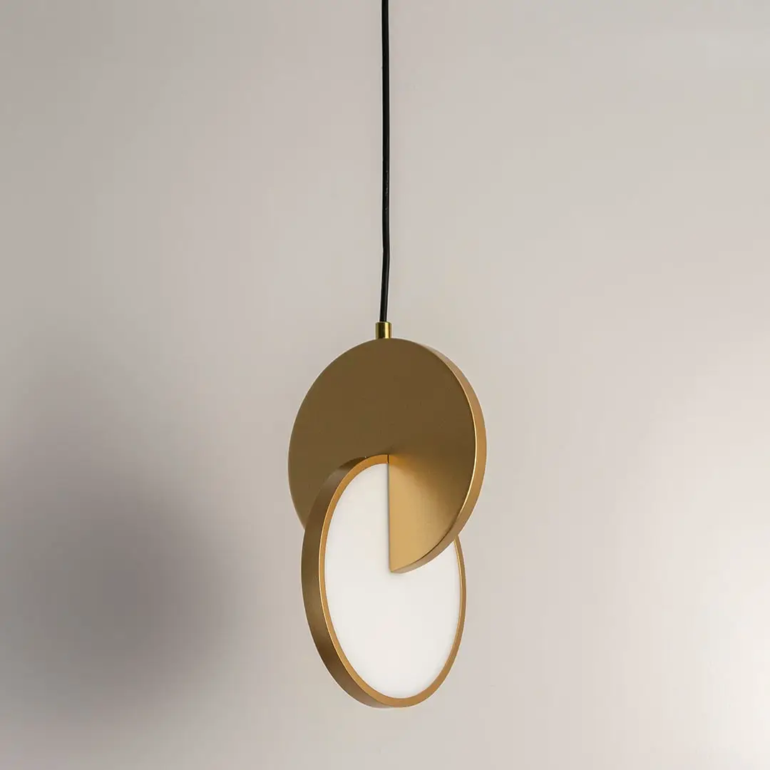 White glass pendant light with black metal accents crafted for contemporary interior spaces.