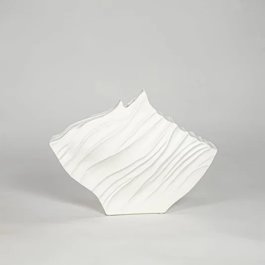 White ceramic abstract designer vase modern decorative flower vase for shelf console table living room home decor styling.