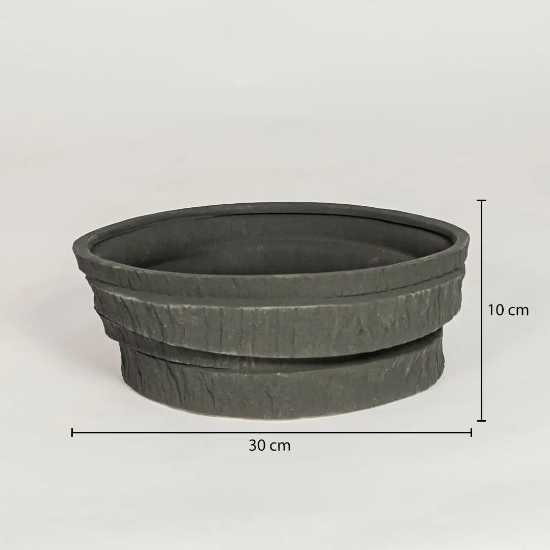 Black ceramic decorative serving bowl showing 30 cm diameter and 10 cm height ideal for dining table centerpiece and kitchen decor display.