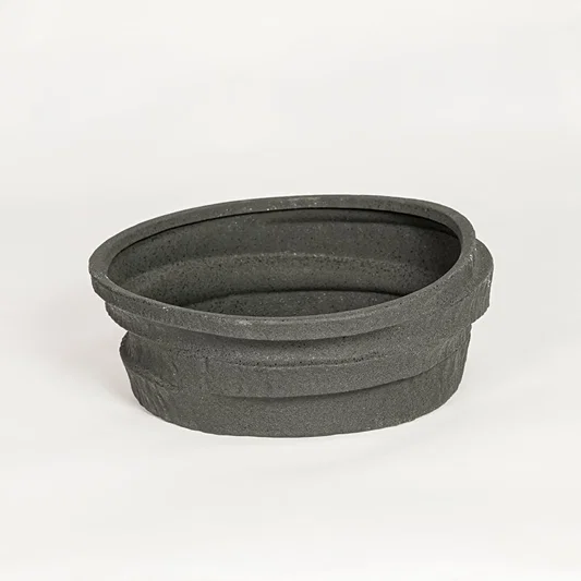 Modern black ceramic decorative serving bowl ideal for fruit display on dining table centerpiece and stylish home decor.
