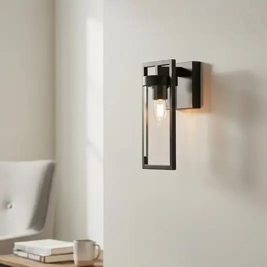Modern black metal wall light with warm glow for stylish hallway and contemporary home decor spaces.