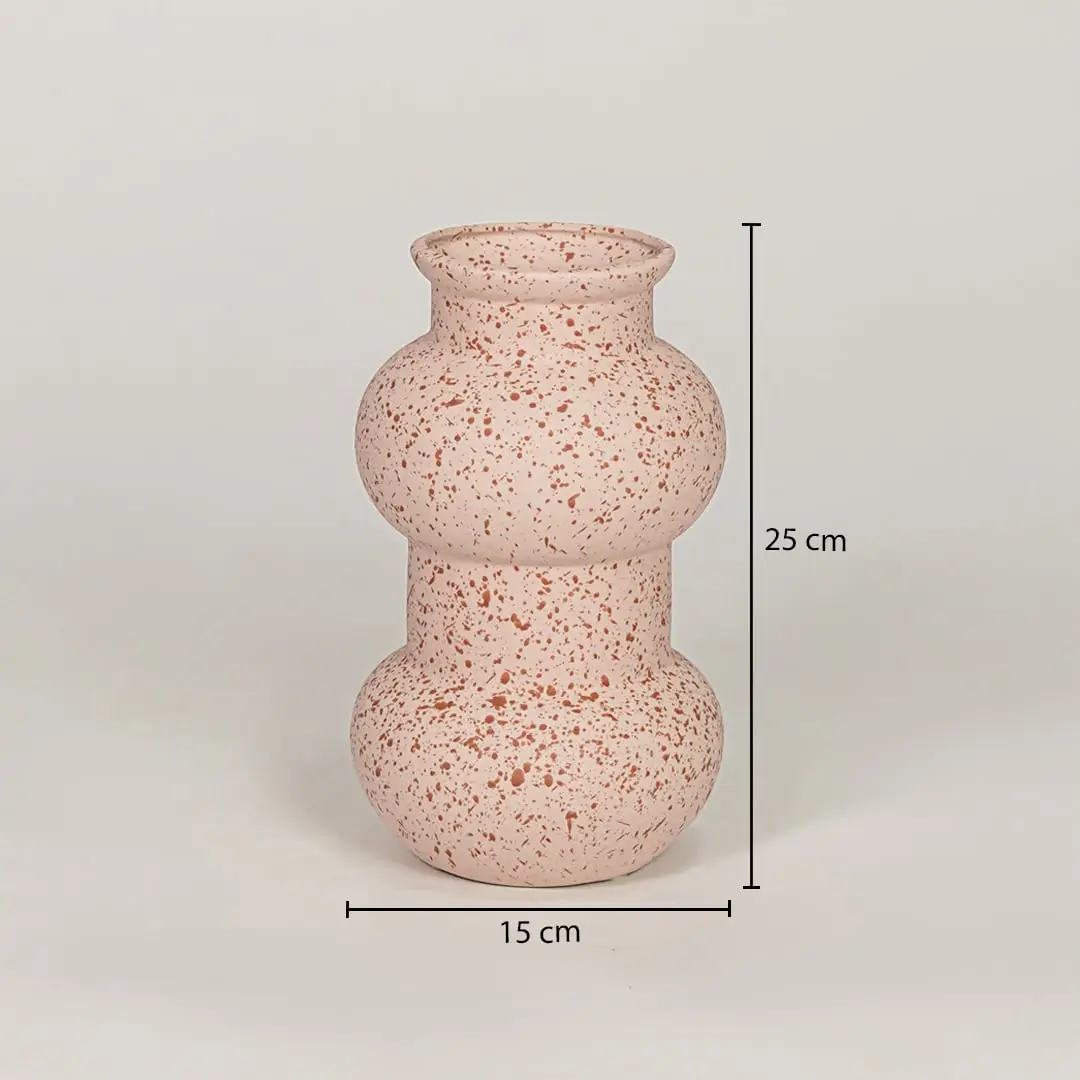 Pink ceramic decorative vase measuring 25 cm height and 15 cm width for modern tabletop decor placement.