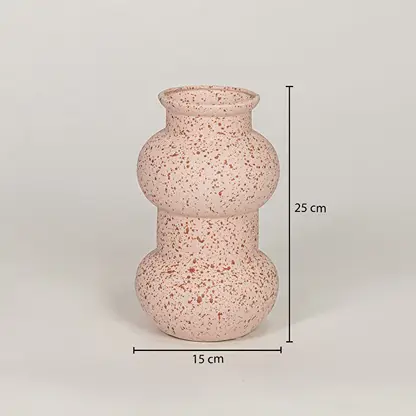 Pink ceramic decorative vase measuring 25 cm height and 15 cm width for modern tabletop decor placement.