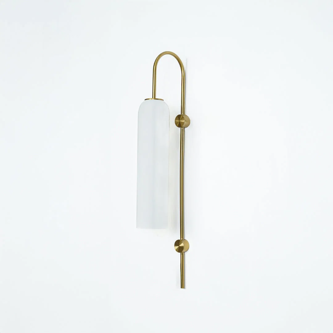 Modern gold metal wall light with white frosted glass shade for elegant bedroom and luxury decor spaces.