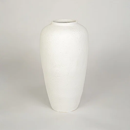 White background image of white ceramic floor vase for elegant home decor styling with textured matte finish.