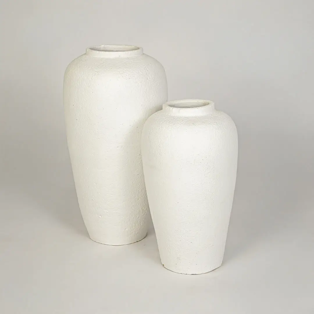 White background image of white ceramic vase set for elegant floor decor styling with textured matte finish.