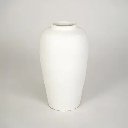 White background image of white ceramic decorative vase for modern interior decor styling with matte finish.