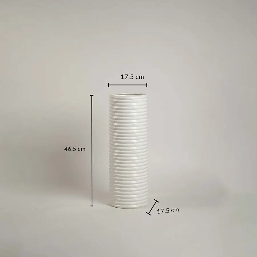 White ribbed ceramic vase measuring 46.5 cm height and 17.5 cm width shown on white background with handcrafted finish.