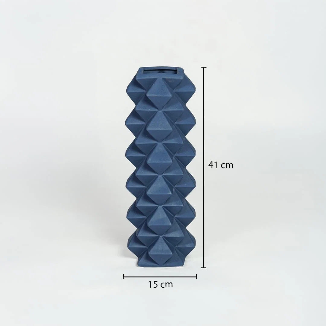 Blue ceramic geometric floor vase measuring 41 cm height and 15 cm width ideal for modern corner decor placement.