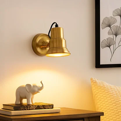 Gold metal wall light mounted near sofa adding warm focused lighting for reading corners and elegant living room Decor.