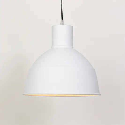 White metal dome pendant light with gold trim designed for modern dining room and home decor.
