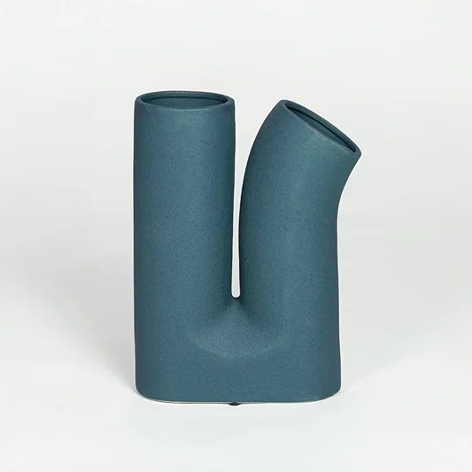 Contemporary teal ceramic double neck flower vase with smooth matte finish for minimalist home decor.