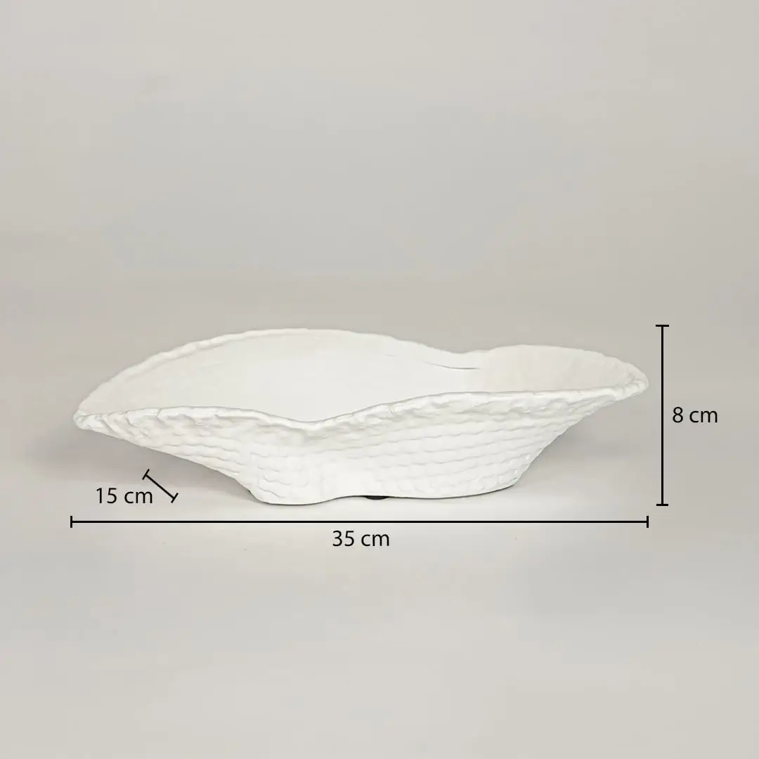 White ceramic decorative serving bowl showing 35 cm length 15 cm width and 8 cm height ideal for dining table centerpiece decor.