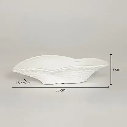 White ceramic decorative serving bowl showing 35 cm length 15 cm width and 8 cm height ideal for dining table centerpiece decor.
