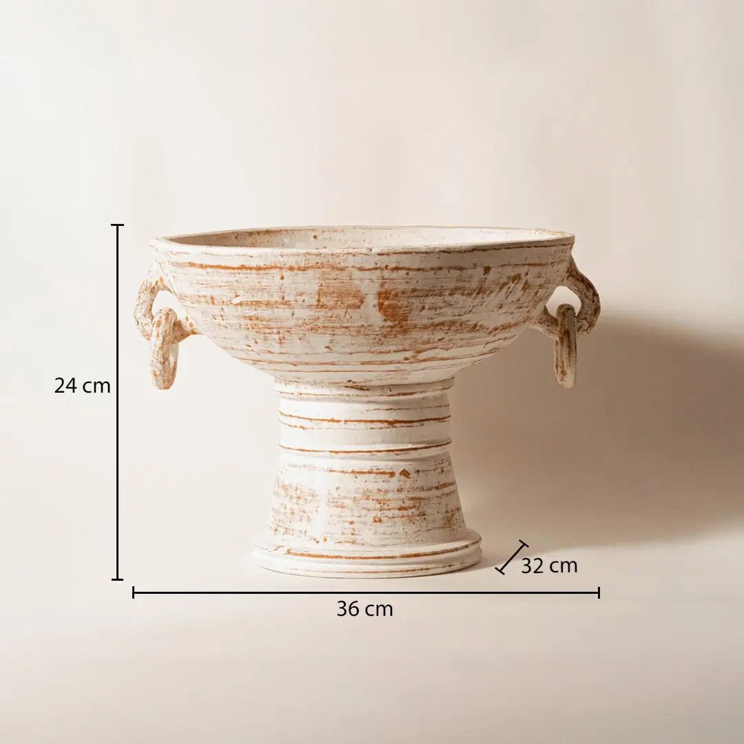 White ceramic decorative pedestal bowl measuring 24 cm height and 36 cm width for elegant tabletop decor.