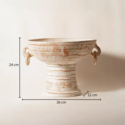 White ceramic decorative pedestal bowl measuring 24 cm height and 36 cm width for elegant tabletop decor.