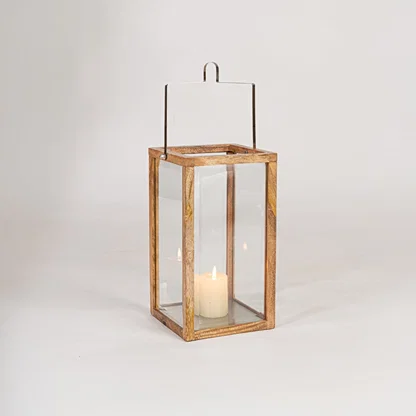 Decorative tall wooden lantern with glass panels on white background designed for floor placement and ambient Decor.