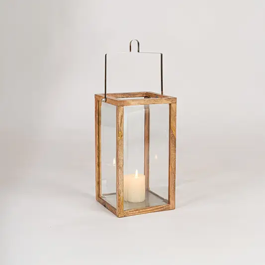 Decorative tall wooden lantern with glass panels on white background designed for floor placement and ambient Decor.