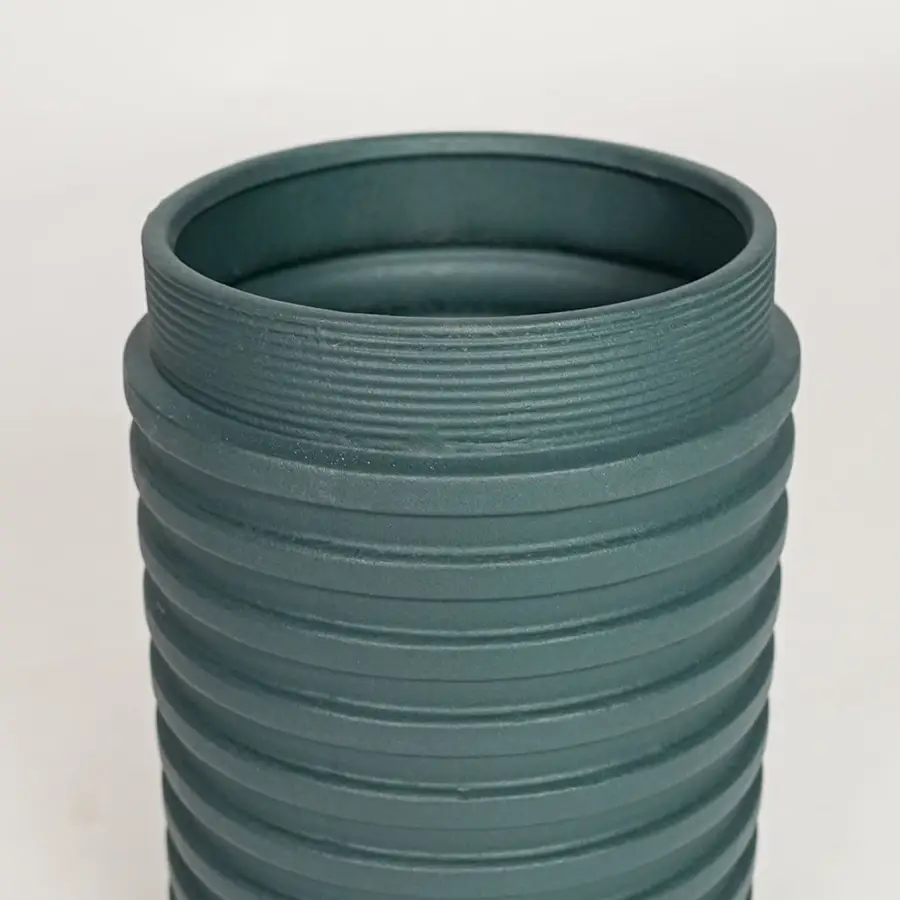 Green ceramic decorative vase with detailed ribbed texture perfect for elegant dried floral display and modern interior decor.