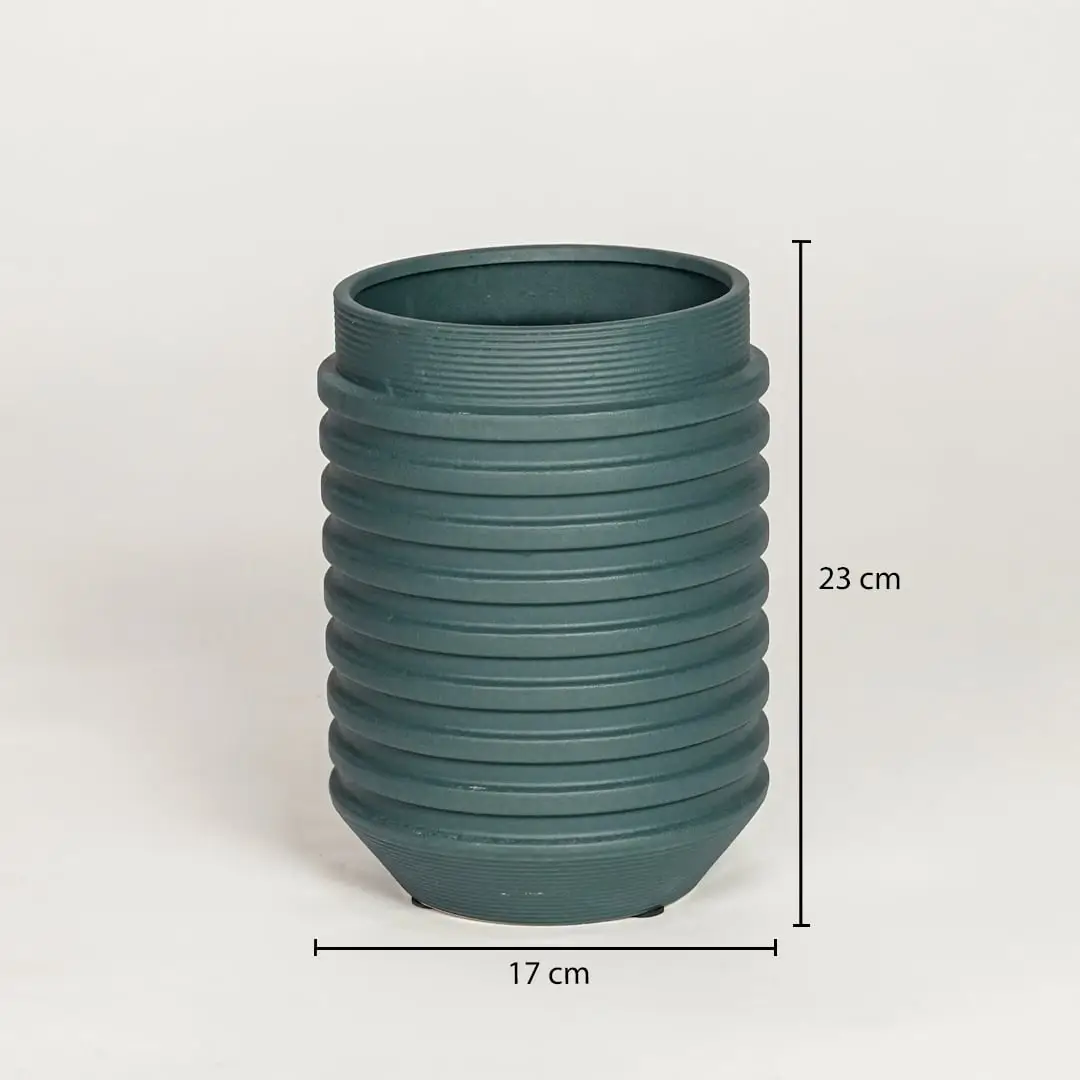 Green ceramic decorative vase showing 17 cm width and 23 cm height ideal for console table shelf and home decor display.