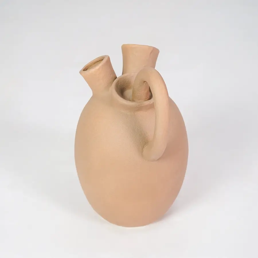 Minimalist beige ceramic vase for stylish console table placement and contemporary home decor styling piece.