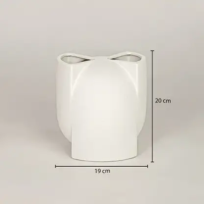 White ceramic decorative vase measuring 26 cm height and 19 cm width for modern tabletop decor placement.