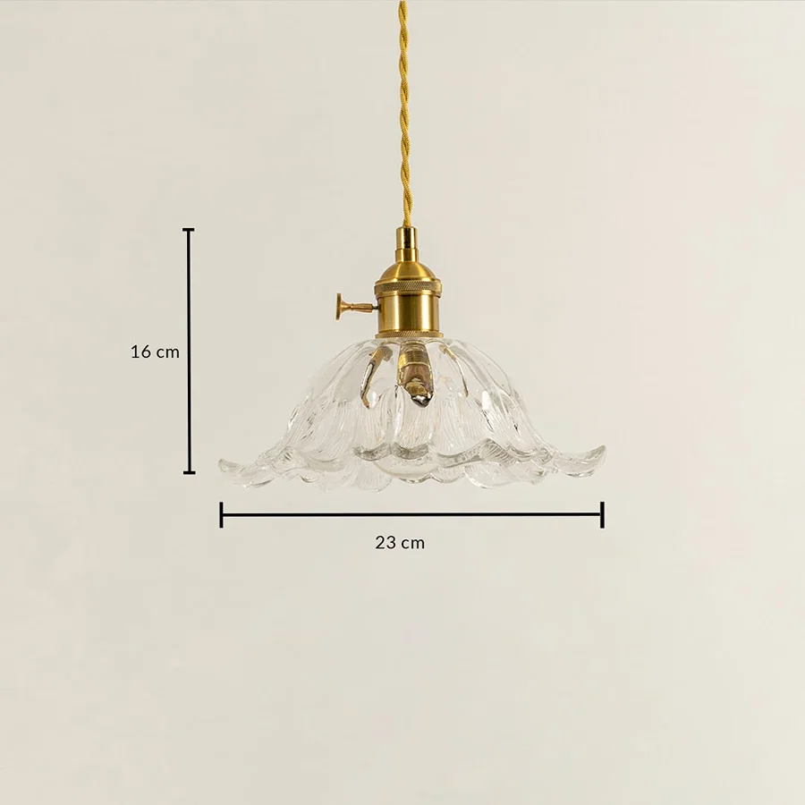 Clear wavy glass and brass pendant light dimension image with 23 cm width and 16 cm height for luxury dining placement.