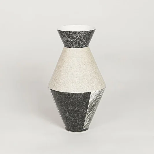 Contemporary black and white ceramic flower vase with artistic design perfect for entryway table living room decor display.