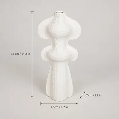 White textured ceramic vase with dimension markings showing height of 36 cm, base width of 17 cm, and depth of 7 cm on a light gray background.