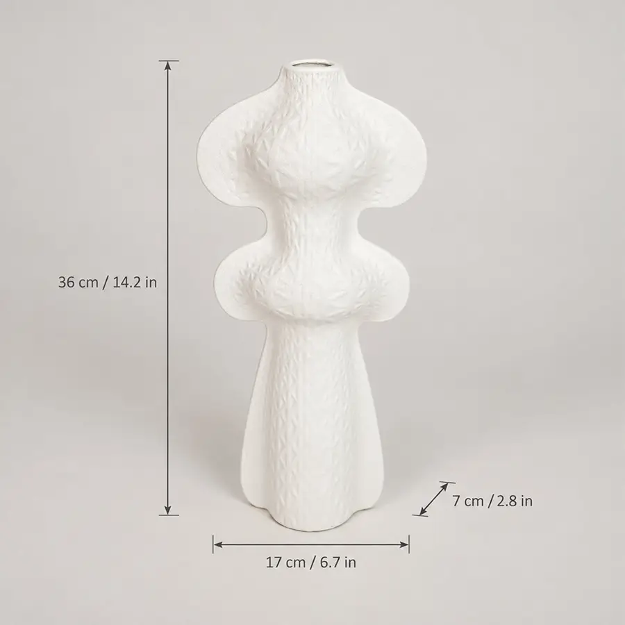 White textured ceramic vase with dimension markings showing height of 36 cm, base width of 17 cm, and depth of 7 cm on a light gray background.