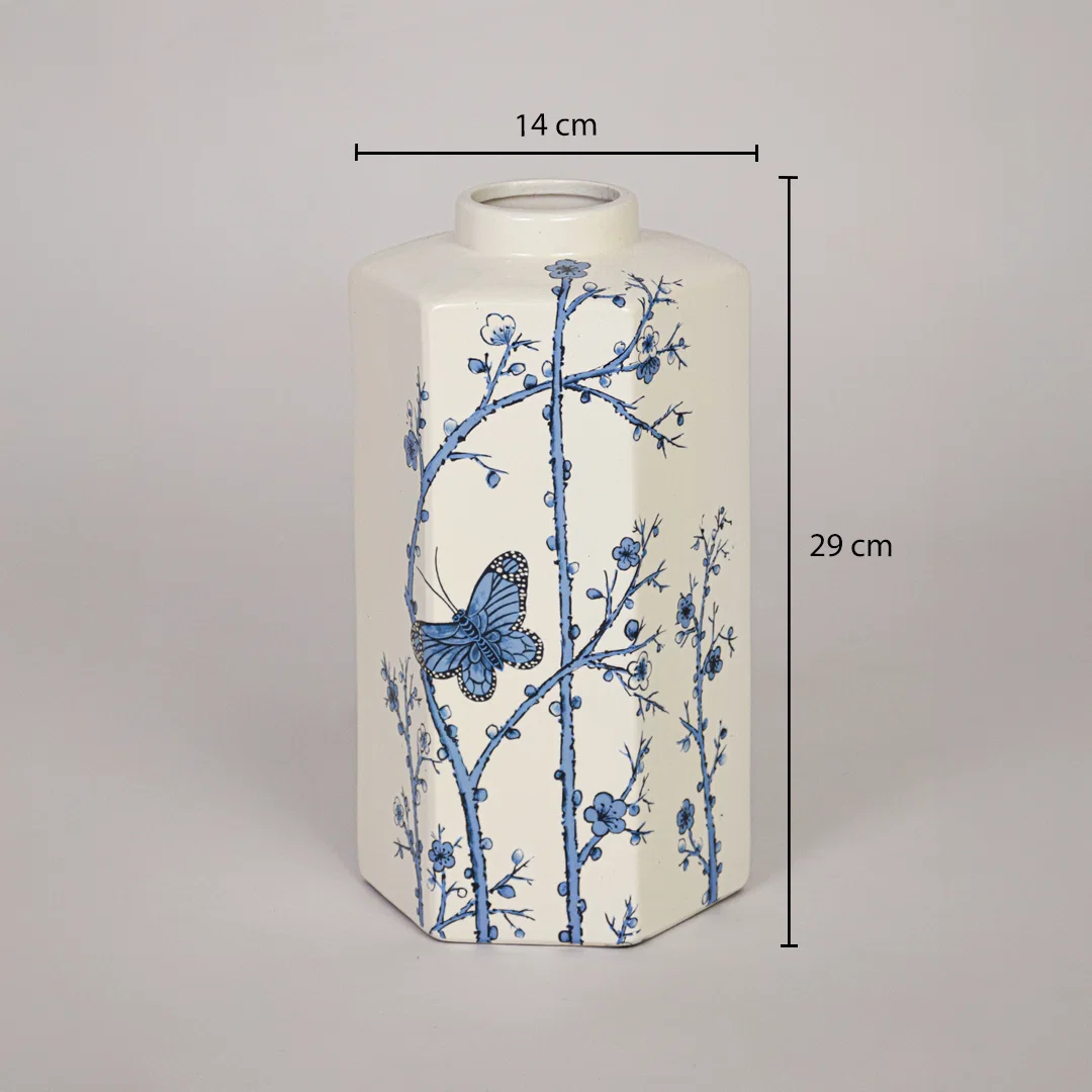 Cream ceramic decorative vase shown with 29 cm height and 14 cm width measurements for accurate tabletop placement planning.