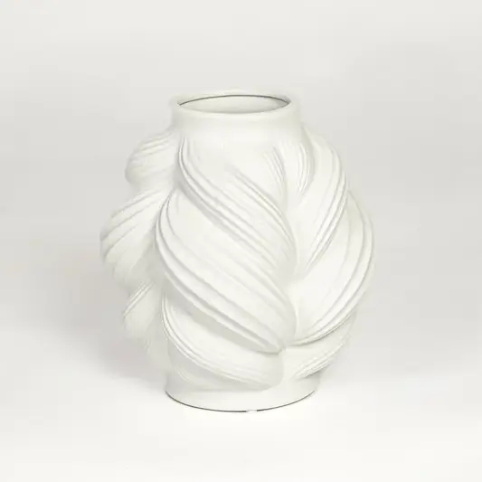 White ceramic sculpted leaf design vase with layered curved pattern isolated on clean white background for modern decor styling.