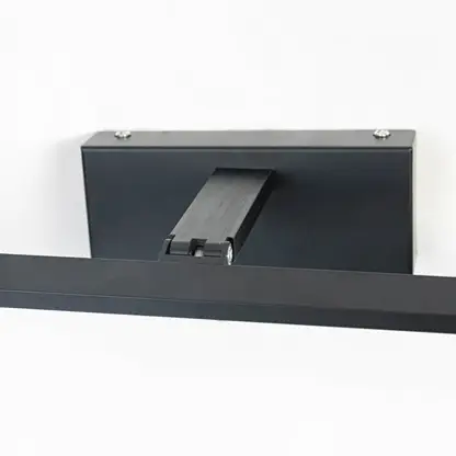 Sleek unlit black LED wall light on black background emphasizing minimalist form  precision finish  and linear silhouette.