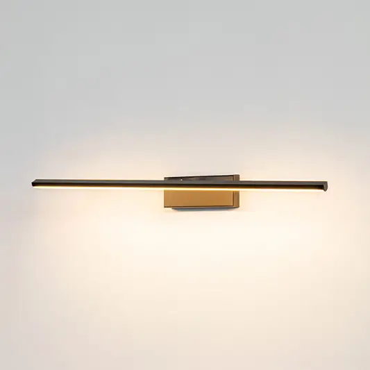 Minimal wall light in gold metal finish with linear bar design for bathroom or vanity decor lighting white background.