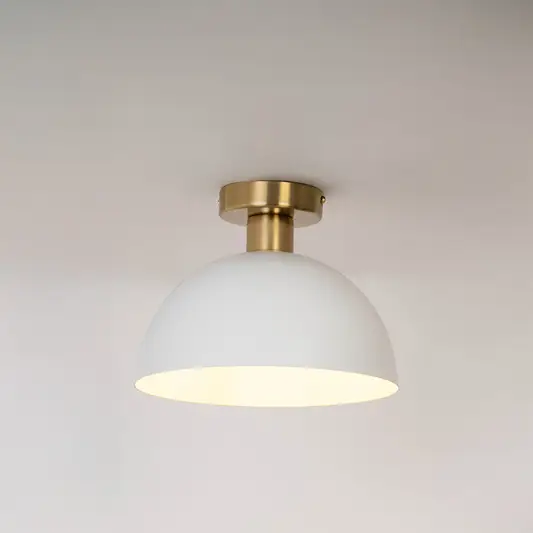 Modern white metal dome ceiling light with soft ambient lighting for elegant hallway and contemporary decor spaces.