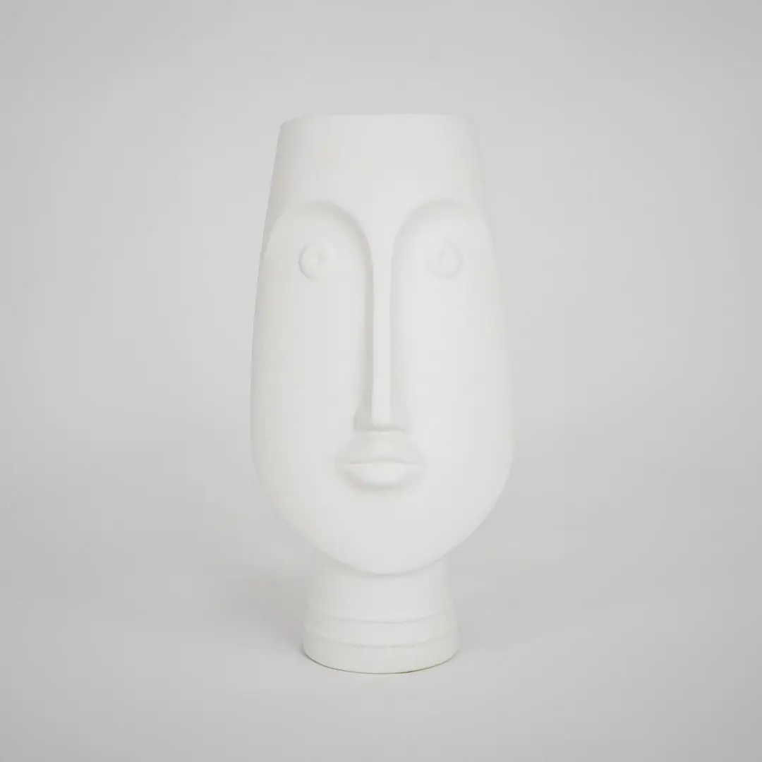 White face ceramic vase for elegant console table placement and contemporary indoor home decor styling piece.