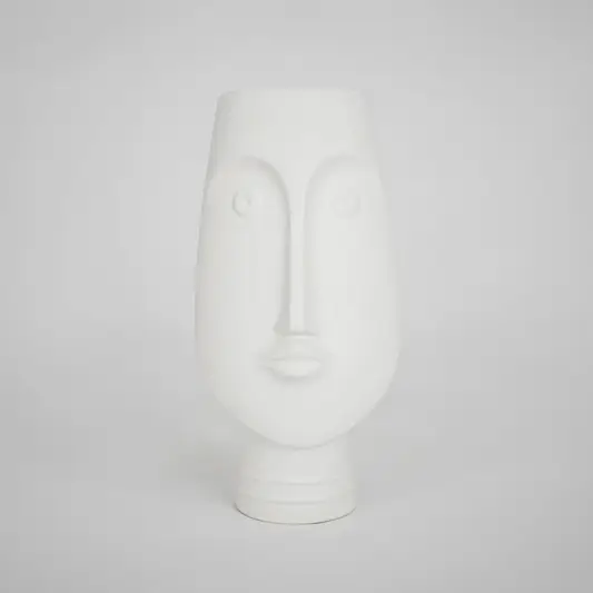 White face ceramic vase for elegant console table placement and contemporary indoor home decor styling piece.