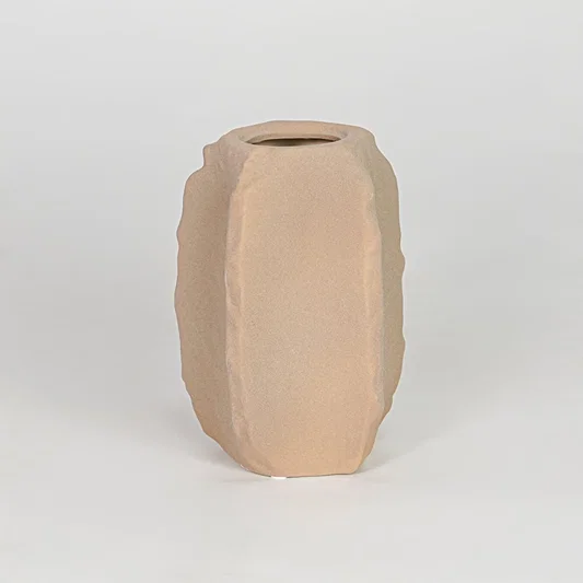 Modern beige decorative flower vase isolated clean background stylish ceramic vase for table shelf console decor.