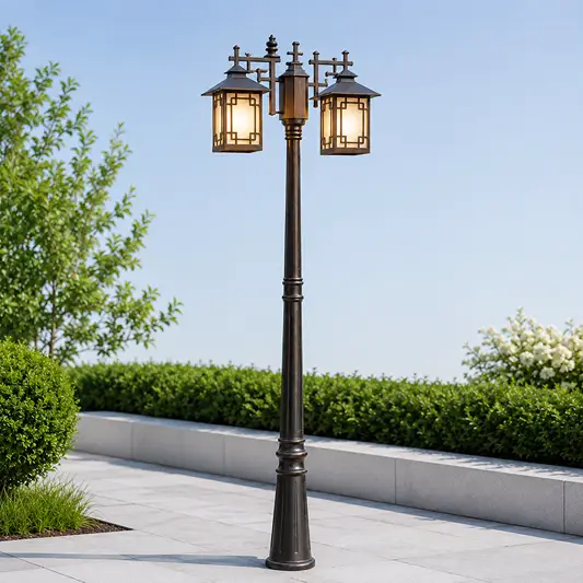 Antique bronze aluminum double head street lamp post light on paved courtyard walkway for outdoor garden driveway styling.