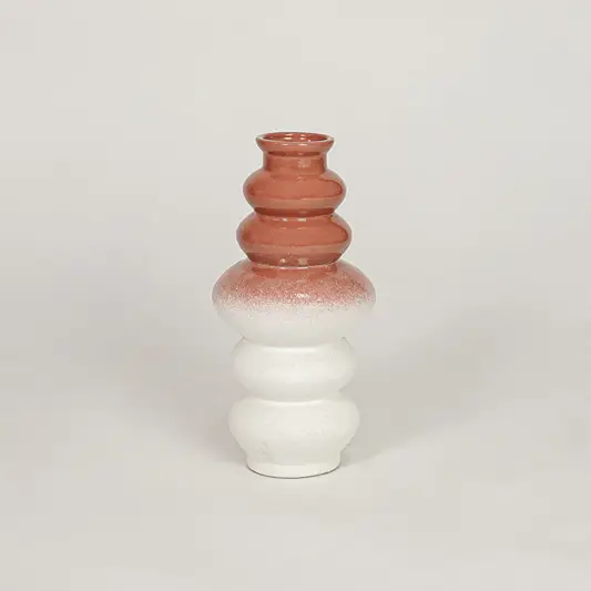 Stacked ceramic vase with terracotta and white ombre finish for artistic home decor and modern shelf centerpiece.