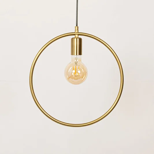 Gold metal ring pendant light with exposed bulb designed for elegant dining room decor spaces.